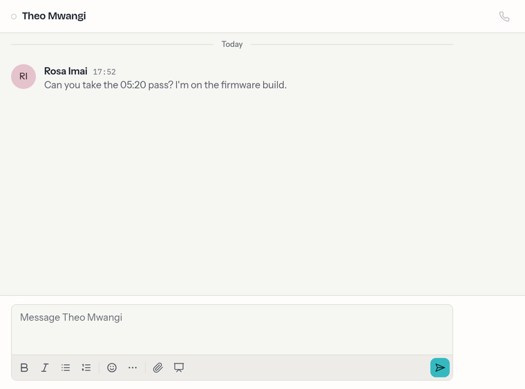 A direct message with Theo Mwangi: a presence dot beside their name in the header, one message, and a composer reading Message Theo Mwangi.